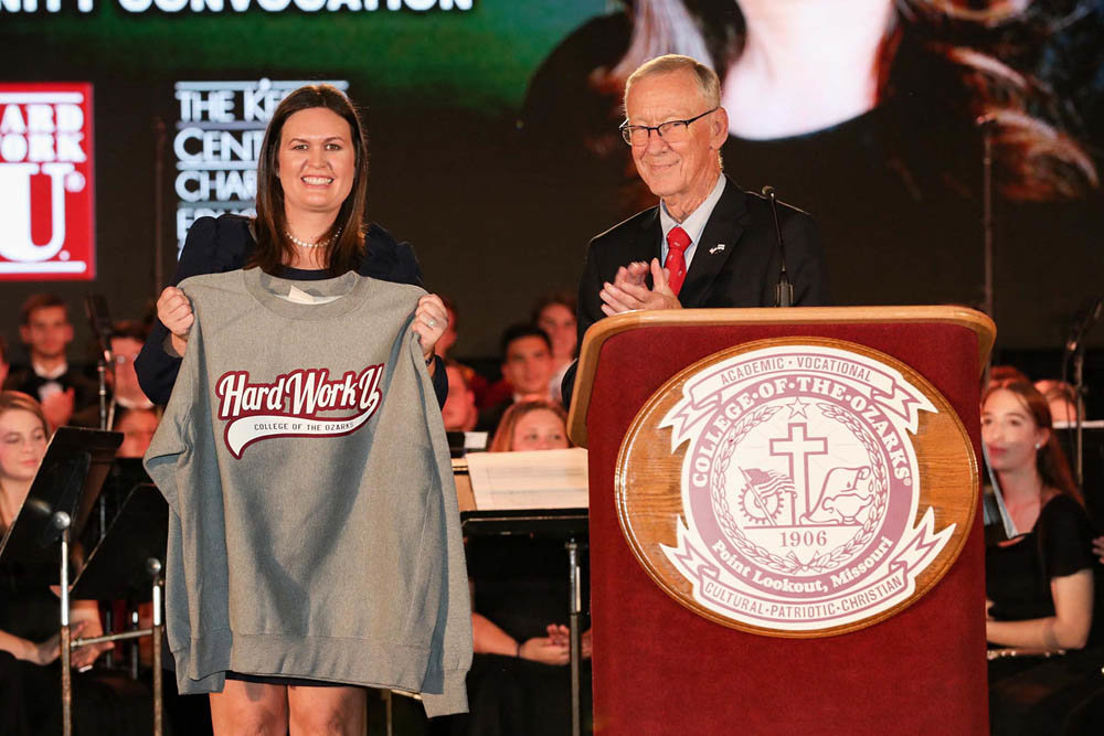 SANDERS AT C OF O
Former White House press secretary Sarah Huckabee Sanders, left, receives a College of the Ozarks sweater from school President Jerry Davis following her address to the student body Oct. 10. C of O officials say over 3,000 people attended the fall convocation to hear Sanders at the Keeter Athletic Complex on campus. She served as press secretary for President Donald Trump from 2017 until she resigned this summer. Sanders resides in Arkansas, where her father, Mike Huckabee, had a long stint as governor.